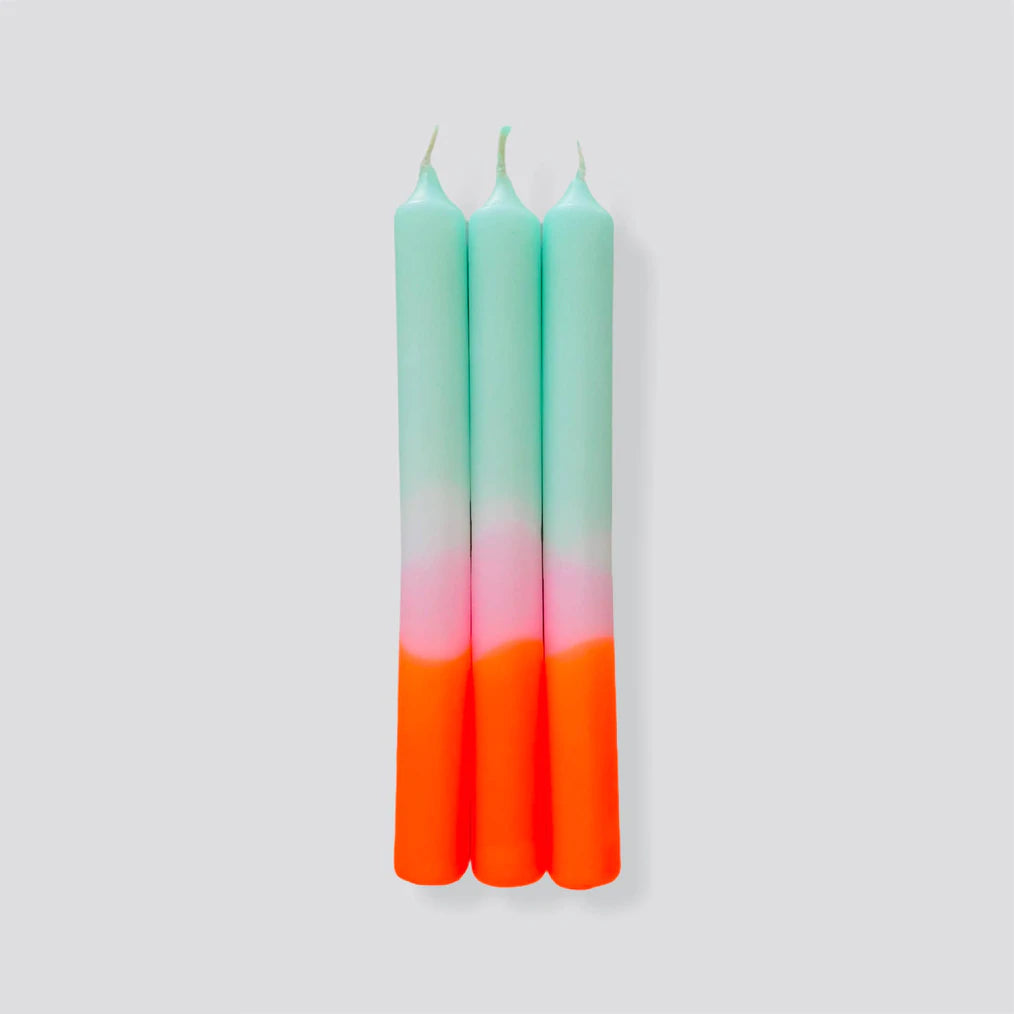 orange and blue tapered candles