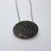 black dotted pendant
