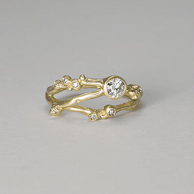 gold diamond solitaire ring