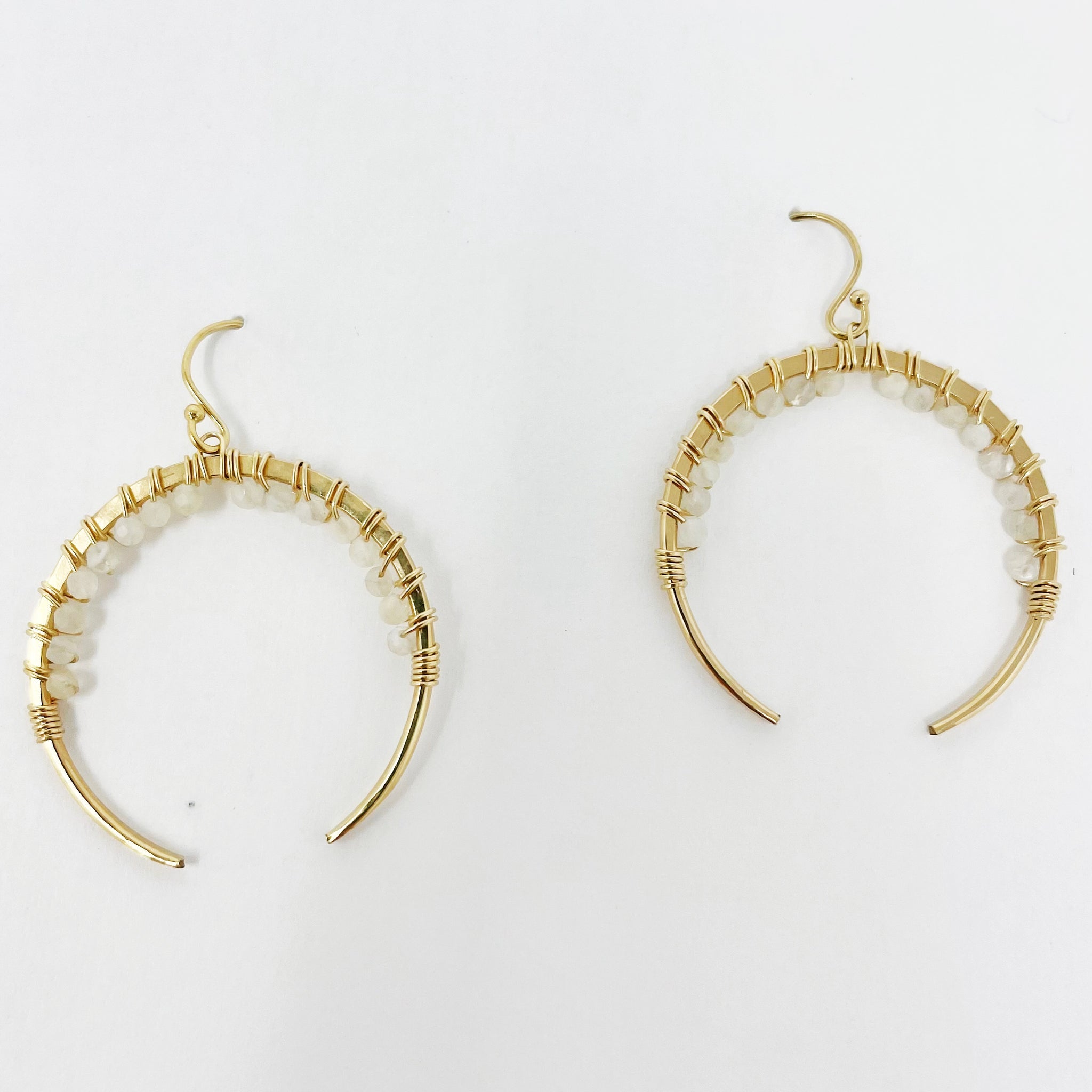 white stone gold crescent hoops