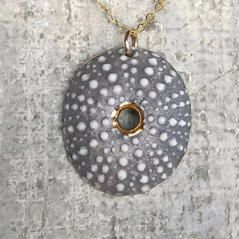 Porcelain sea urchin gold necklace